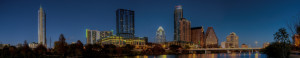 Photograph of downtown Austin in evening with skyscrapers
